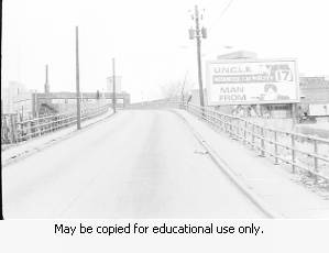 Channel 17 WJRJ-TV Billboard advertisement U.N.C.L.E> and Man From Week nites at 7:30, Billboard is located infront of W.B. George MFG CO. February 16,1970.