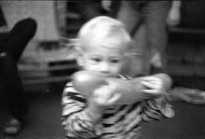 Family photos: Tom and Stephanie Coffin's child with a balloon, Atlanta, Georgia, September 1, 1974.