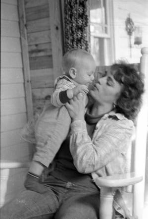 Family photos: Stephanie Coffin with her child on front porch, Atlanta, Georgia, June 2, 1974.