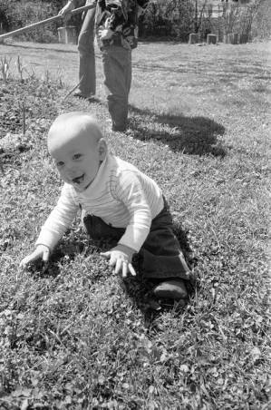 Family photos: Tom and Stephanie Coffin's child playing on the lawn, Atlanta, Georgia, April 1, 1974.