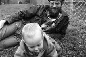Family photos: Tom Coffin with his child on the lawn, Atlanta, Georgia, April 1, 1974.