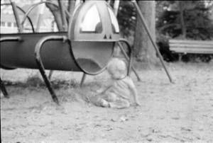 Family photos: Tom and Stephanie Coffin's child outside with playground toy, Atlanta, Georgia, September 1, 1974.