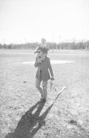 Stephanie Coffin and her son watching the hang gliding in Piedmont Park, Atlanta, Georgia, January 3, 1975.