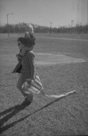 Stephanie Coffin and her son watching the hang gliding in Piedmont Park, Atlanta, Georgia, January 3, 1975.