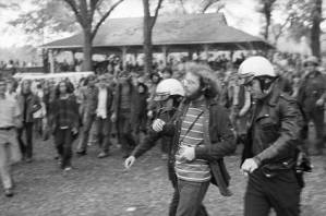 "Great Speckled Bird" photographer Bill Fibben being arrested during a botched police operation during a concert in Piedmont Park, Atlanta, Georgia, September 21, 1969.