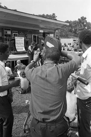 Film crew setting up to record the Celestial Voluptous Banana show in Piedmont Park, 1970