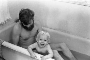 Tom Coffin and his son taking a bath, 1969