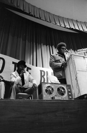 Michael Cetewayo Tabor delivers a speech at a Black Panthers Party meeting, 1970