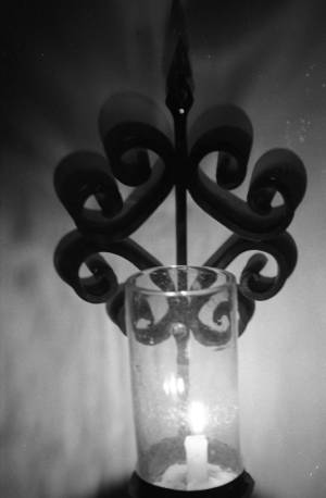 Lit candle wall sconce, 1969