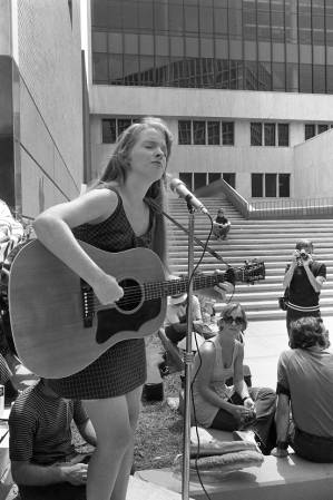 Anne Romaine performing outside of Sparks Hall at Georgia State University, 1970