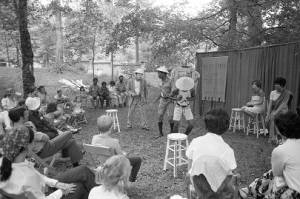 Actors performing Bertolt Brecht's play "The Exception and the Rule" to an audience, 1969
