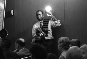 Reporter at a transit fare increase hearing, 1969