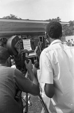 Film crew setting up to record the Celestial Voluptous Banana show in Piedmont Park, 1970