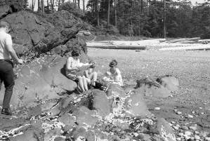 Stephanie Coffin and family walking on the beach, Whidbey Island, 1969