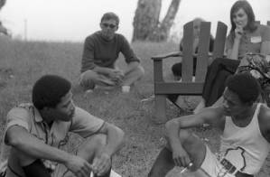 Audience at a performance of Bertolt Brecht's play "The Exception and the Rule" in an outdoor venue, 1969