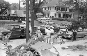 Police cars with seized Molotov cocktails near the Colony Square building site, 1969