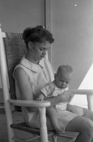 Stephanie and Zachary Coffin in a rocking chair, 1969
