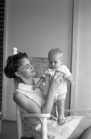 Stephanie and Zachary Coffin in a rocking chair, 1969