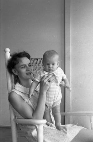 Stephanie and Zachary Coffin in a rocking chair, 1969