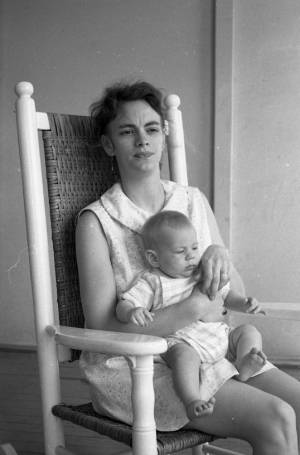 Stephanie and Zachary Coffin in a rocking chair, 1969