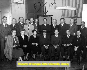 F. H. "Pug" King with unidentified group