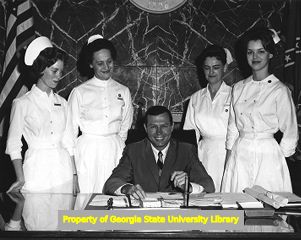 Georgia Governor Carl Sanders signing nursing proclamation, 1965