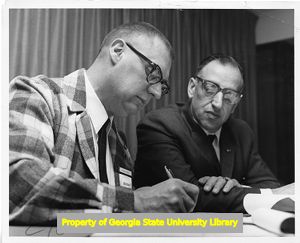 United Furniture Workers of America delegates make notes