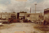 Destroyed building and forklift