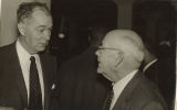 Two men speaking