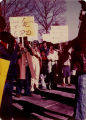 Protesters with signs, "See Gunsmoke In Person G.P.D." and "This is the last Straw. We are drawing the line Now! Collis Madder was Unjustly Murdered"