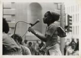 Woman speaking at Fight Back demonstration