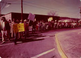 Protesters with signs, "See Gunsmoke In Person G.P.D." and "Give Me Freedom Now!!!"