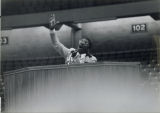Man speaking at a podium