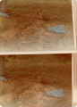 Two photographs of dirt covered corpse
