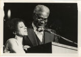 Ruby Dee and Ossie Davis at a podium
