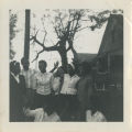 Group posing on a sidewalk