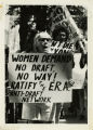 Protester with sign, "Women demand no draft. No way! Ratify the E.R.A. Anti-Draft Network"