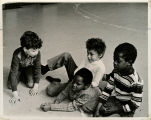 Children sitting on floor