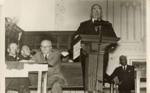 Man speaking at podium
