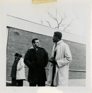 Two men speaking