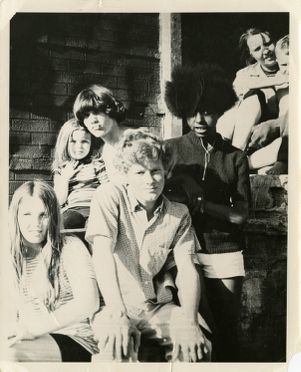 Youths pose on stairs