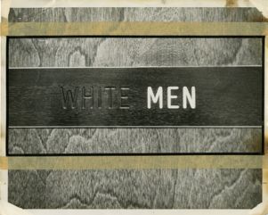 Sign reading "White Men"