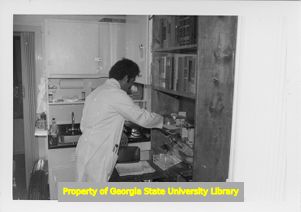 Stocking the supply shelf in a Mobile Health Center unit