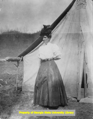 Woman outside of tent, C. J. French collection