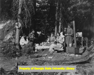 Group eating outdoors, C. J. French collection
