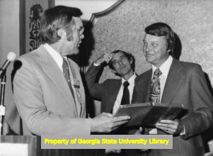 Herbert Mabry presenting a plaque.