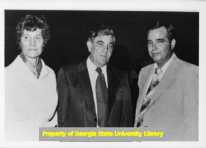 George Caudelle, Herbert C. Green, and an unidentified woman