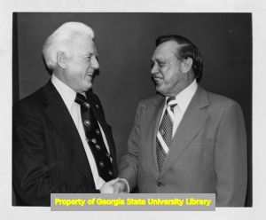 Secretary of Labor Peter Brennan and W. H. McMullen