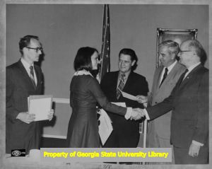 Winner of "Hiring the Handicapped" contest receives award, Atlanta, Georgia, circa 1971.