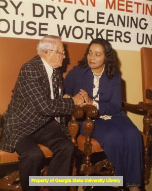 Coretta Scott King speaking with E. L. Abercrombie at a Laundry Workers Union Local 218 event, Atlanta, Georgia, early 1970s.